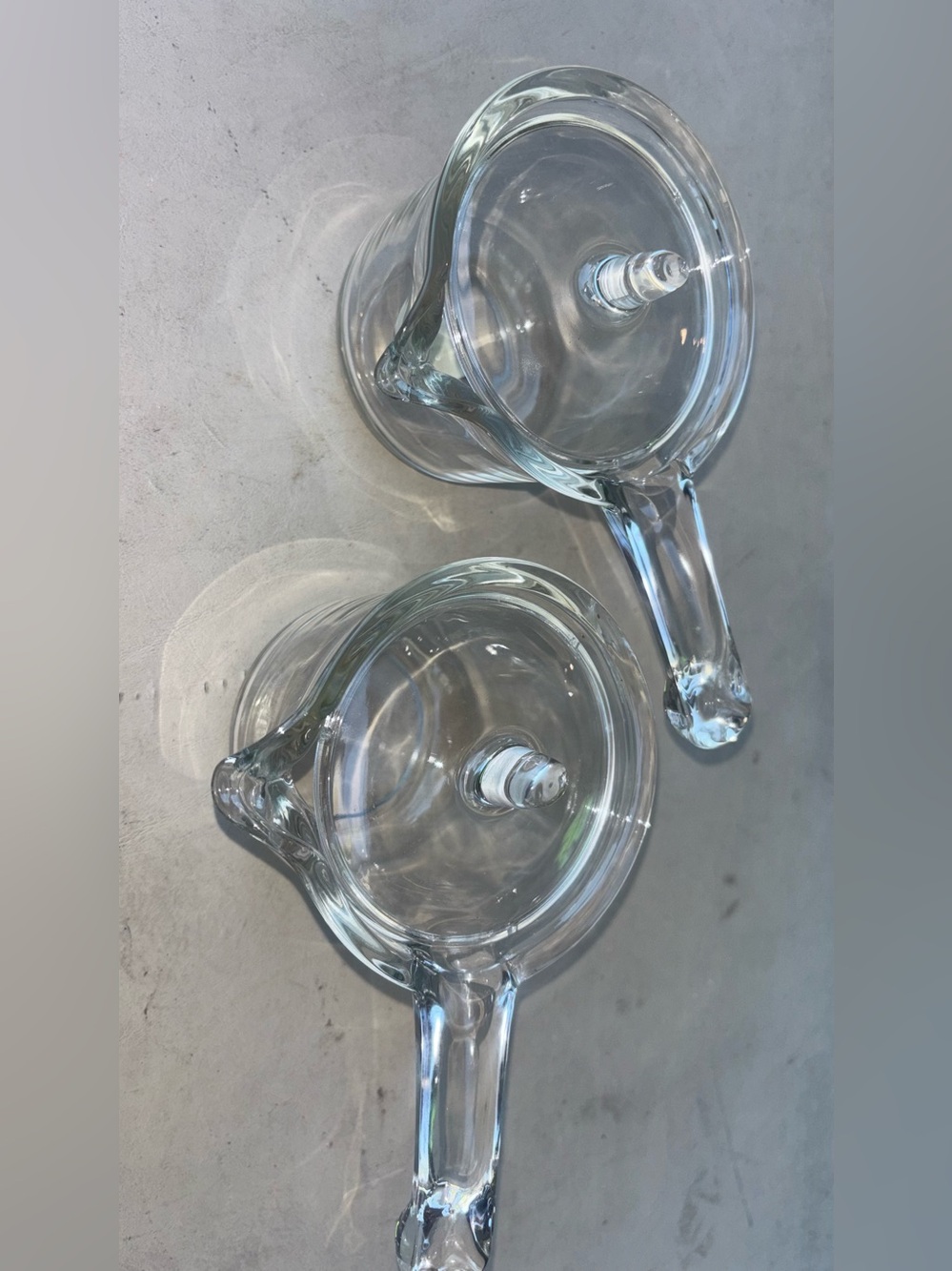 Set of Two Crate and Barrel Clear Glass small pots with Lids